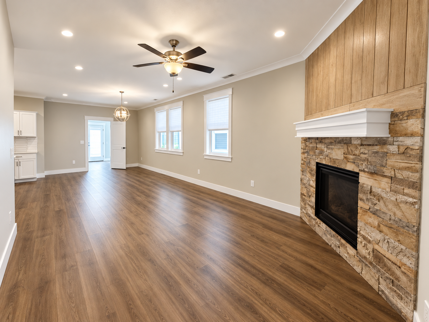 Living room with a stone fireplace in a Star rental property serviced by Genesis Pro Solutions